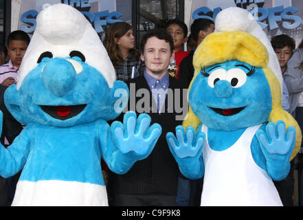 CLUMSY & ANTON YELCHIN & SMURFETTE THE SMURFS HONORED WITH HAND AND FOOTPRINTS HOLLYWOOD LOS ANGELES CALIFORNIA USA 13 Decemb Stock Photo