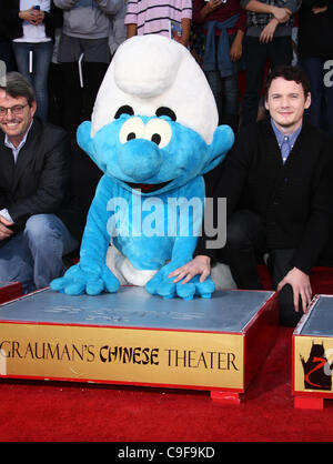 CLUMSY & ANTON YELCHIN THE SMURFS HONORED WITH HAND AND FOOTPRINTS HOLLYWOOD LOS ANGELES CALIFORNIA USA 13 December 2011 Stock Photo