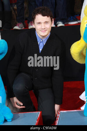 Dec. 13, 2011 - Los Angeles, California, U.S. - Anton Yelchin.The ''SMURFS'' Honored with Hand and Footprint Ceremony  held at  The Grauman's Chinese Theatre,Los Angeles,CA. December 13-2011.(Credit Image: Â© TLeopold/Globe Photos/ZUMAPRESS.com) Stock Photo