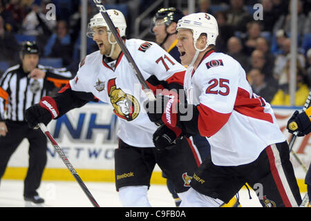 Dec. 13, 2011 - Buffalo, New York, U.S - Ottawa Senators right wing Chris Neil (25) starts to celebrate following the goal in the third period against the Buffalo Sabres at the First Niagara Center in Buffalo, NY.  Ottawa defeated Buffalo 3-2 in overtime. (Credit Image: © Michael Johnson/Southcreek/ Stock Photo