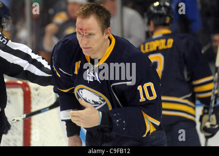 Dec. 13, 2011 - Buffalo, New York, U.S - Buffalo Sabres defenseman Christian Ehrhoff (10) skates to the bench bloodied after the third period fight against Ottawa Senators left wing Colin Greening (14) at the First Niagara Center in Buffalo, NY.  Ottawa defeated Buffalo 3-2 in overtime. (Credit Imag Stock Photo