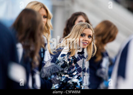 Dec. 17, 2011 - Boise, Idaho, United States of America - 17 December 2011: Utah State cheerleader during first half action of the Famous Idaho Potato Bowl in Boise Idaho. The Utah State Aggies led the Ohio Bobcats 9-7 at the half. (Credit Image: © Stanley Brewster/Southcreek/ZUMAPRESS.com) Stock Photo