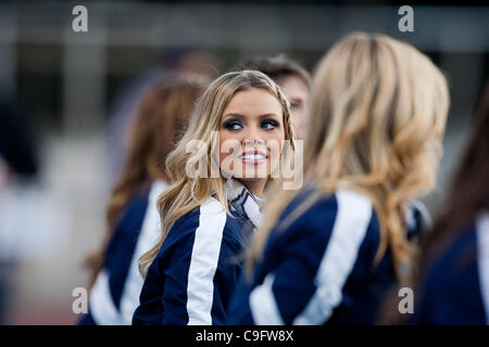 Dec. 17, 2011 - Boise, Idaho, United States of America - 17 December 2011: One of the Utah State cheerleaders during first half action of the Famous Idaho Potato Bowl in Boise Idaho. The Utah State Aggies led the Ohio Bobcats 9-7 at the half. (Credit Image: © Stanley Brewster/Southcreek/ZUMAPRESS.co Stock Photo