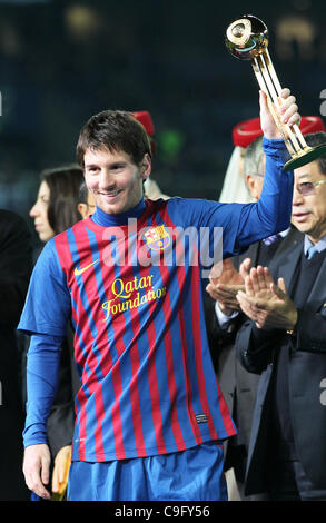 Dec. 18, 2011 - Yokohama, Japan - LIONEL MESSI of FC Barcelona is awarded the prize of Most Valuable Player (MVP) by Toyota Motors president Akio Toyoda during the FIFA Club World Cup Final Match between Santos FC and FC Barcelona at the International Yokohama Stadium on December 18, 2011 in Yokoham Stock Photo