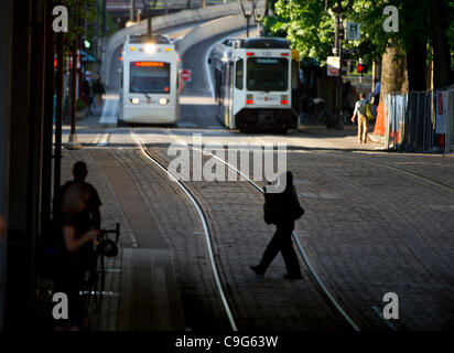 Aug. 3, 2011 - Portland, Oregon, U.S - The MAX approaches the Skidmore Station in the Old Town neighborhood of downtown Portland, Oregon.  The MAX is an above ground public transportation system in Portland. (Credit Image: © Jim Z. Rider/ZUMAPRESS.com) Stock Photo