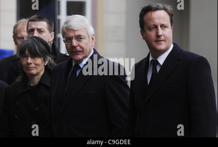 British prime minister David Cameron (right), former British prime minister John Major (second from right) and British ambassador Sian MacLeod arrive for state funeral of former Czech and Czechoslovak President Vaclav Havel in the St. Vitus Cathedral at Prague Castle on Friday, Dec. 23, 2011. From l Stock Photo