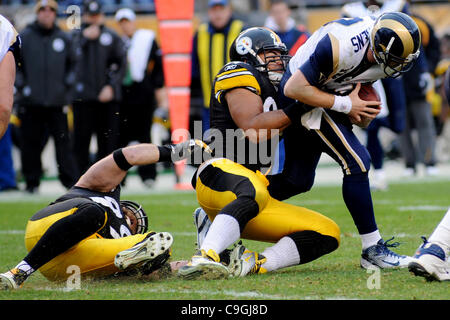 Dec. 24, 2011 - Pittsburgh, PENNSYLVANNIA, U.S - Pittsburgh Steelers defensive end Brett Keisel (99) and Pittsburgh Steelers defensive end Cameron Heyward (97) sack St. Louis Rams quarterback Kellen Clemens (10) during the third quarter as the Pittsburgh Steelers take on the St. Louis Rams at Heinz  Stock Photo