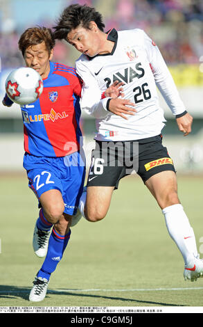 Naotake Hanyu (FC Tokyo), Mizuki Hamada (Reds),  DECEMBER 24, 2011 - Football / Soccer :  91st Emperor's Cup quarterfinal match between F.C.Tokyo 1-0 Urawa Red Diamonds at Kumagaya Athletic Stadium in Saitama, Japan. (Photo by Takamoto Tokuhara/AFLO) Stock Photo