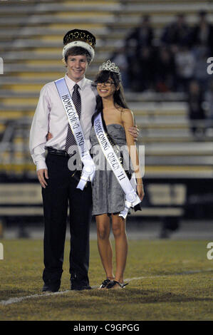October 28, 2011 - Orlando, Florida, U.S. - ARIANNA MUNIZ, daughter of singer MARC ANTHONY, and MICHAEL BENNETT, left, stand in the middle of the football field after being crowned Homecoming Queen and King for Bishop Moore high school. (Credit Image: © Phelan Ebenhack/ZUMApress.com) Stock Photo