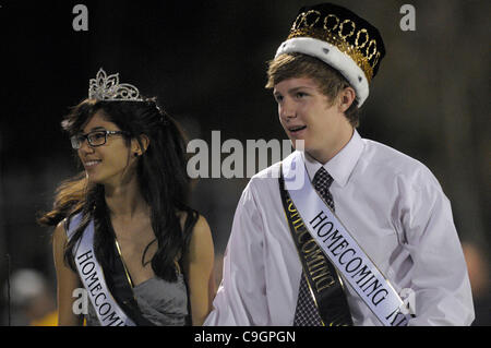 October 28, 2011 - Orlando, Florida, U.S. - ARIANNA MUNIZ, daughter of singer MARC ANTHONY, and MICHAEL BENNETT, right, ride around the track after being crowned Homecoming Queen and King for Bishop Moore high school. (Credit Image: © Phelan Ebenhack/ZUMApress.com) Stock Photo