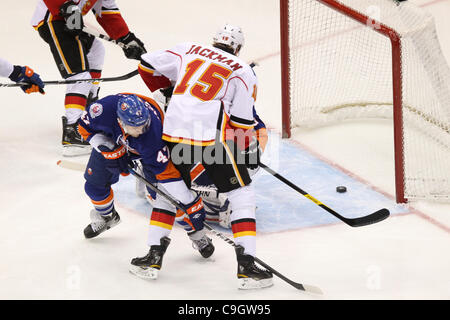 Dec. 29, 2011 - Uniondale, New York, UNITED STATES - Calgary Flames right wing TIM JACKMAN(15) scores a goal against the New York Islanders in the first period at Nassau Veterans Memorial Coliseum. (Credit Image: © Debby Wong/Southcreek/ZUMAPRESS.com) Stock Photo