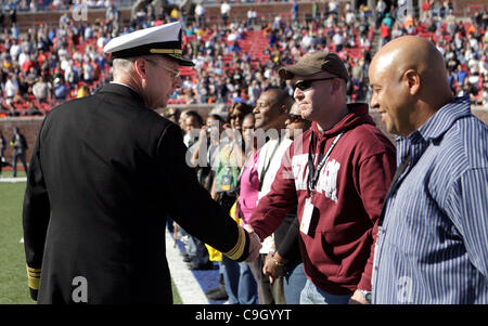 Dec. 30, 2011 - Dallas, Texas, U.S. -- Vice Admiral KEVIN MCCOY greets a line of U.S. military veterans during halftime of the Bell Helicopter Armed Services Bowl at Gerald J. Ford Stadium on the campus of Southern Methodist University. Adm. McCoy is Commander of Naval Sea Systems Command. (Credit I Stock Photo