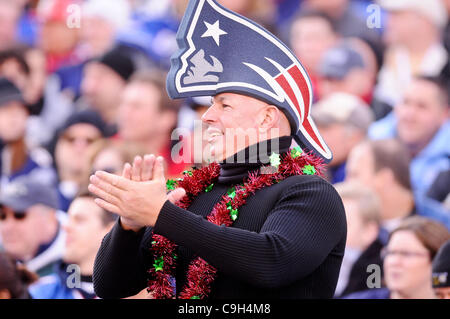 FOXBOROUGH, MA - DECEMBER 24: A New England Patriots fan wearing a foam  Patriots hat and dressed as Santa Claus attends a game between the New  England Patriots and the Cincinnati Bengals