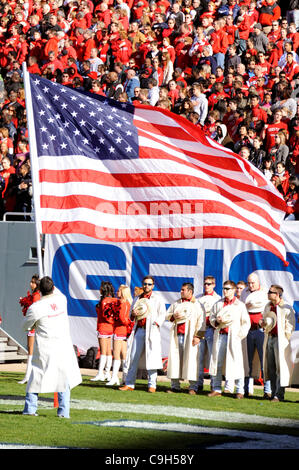 Jan. 2, 2012 - Dallas, Texas, United States of America - The waving of the US flag during the singing of the national anthem as the #19 Houston Cougars face-off against #22 Penn State Nittany Lions at the Cotton Bowl in the 2012 TicketCity Bowl in Dallas, Texas.  The Cougars lead the Nittany Lions 2 Stock Photo