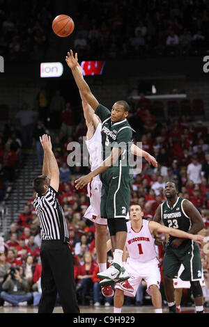 Jan. 3, 2012 - Madison, Wisconsin, U.S - Michigan State center Adreian Payne #5 wins the tip at the start of overtime. The Michigan State Spartans defeated the Wisconsin Badgers in overtime 63-60 at the Kohl Center in Madison, Wisconsin. (Credit Image: © John Fisher/Southcreek/ZUMAPRESS.com) Stock Photo