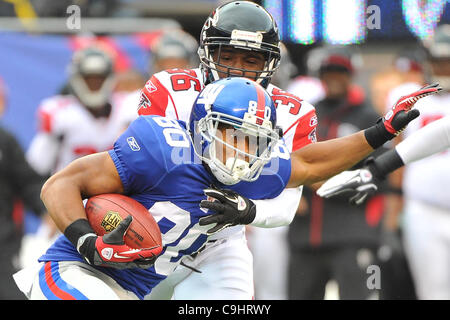 Wide receiver Victor Cruz (80) of the New York Giants kissed the  championship trophy at the conclusion of Superbowl XLVI on Sunday, February  5, 2012, at Lucas Oil Stadium in Indianapolis, Indiana.