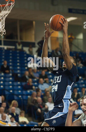 Jan. 11, 2012 - Newark, Delaware, United States of America - 01/11/12 Newark DE: Old Dominion Guard Kent Bazemore #24 perpares to dunk the basketball during a Colonial Athletic Association conference Basketball Game at Delaware Wed, Jan. 11, 2012 at the Bob Carpenter Center in Newark Delaware. (Cred Stock Photo