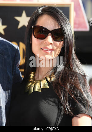 LUCY LIU JOHN WELLS HONORED WITH A STAR ON THE HOLLYWOOD WALK OF FAME HOLLYWOOD LOS ANGELES CALIFORNIA USA 12 January 2012 Stock Photo