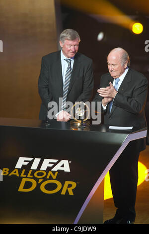 (L-R) Sir Alex Ferguson, Joseph Blatter, JANUARY 9, 2012 - Football / Soccer : Sir Alex Ferguson receives the FIFA Presidential Award trophy from Joseph Blatter during the FIFA Ballon d'Or 2011 Gala at Kongresshaus in Zurich, Switzerland. (Photo by Enrico Calderoni/AFLO SPORT) [0391] Stock Photo