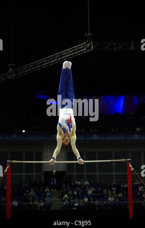 Daniel Purvis (Great Britain) competing in Men's Horizontal Bar in Visa International Gymnastics Competition Artistic discipline in North Greenwich Arena at LOCOG London Prepares series for London 2012 Olympic Games. 13 January 2012. Stock Photo