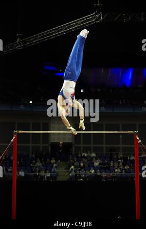 Daniel Purvis (Great Britain) competing in Men's Horizontal Bar in Visa International Gymnastics Competition Artistic discipline in North Greenwich Arena at LOCOG London Prepares series for London 2012 Olympic Games. 13 January 2012. Stock Photo