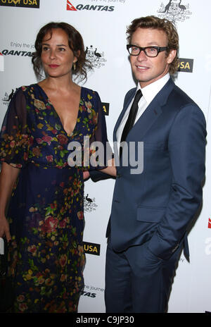 REBECCA RIGG & SIMON BAKER G'DAY USA AUSTRALIA WEEK 2012 BLACK TIE GALA HOLLYWOOD LOS ANGELES CALIFORNIA USA 14 January 2012 Stock Photo