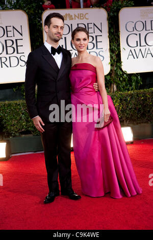 Benjamin Millepied and Natalie Portman arrive to the 69th Annual Golden Globe Awards at the Beverly Hilton Hotel in Beverly Hills, California on Sunday, January 15, 2012. Stock Photo