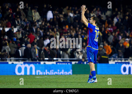 19/01/2011 - VALENCIA, Spain // COPA DEL REY FOOTBALL - VAlencia CF vs. Levante UD. - 1/4 finals - Estadio Mestalla ------------ Juanfran from Levante UD congratulating with Levante UD supporters that came to the rival stadium to see the game Stock Photo