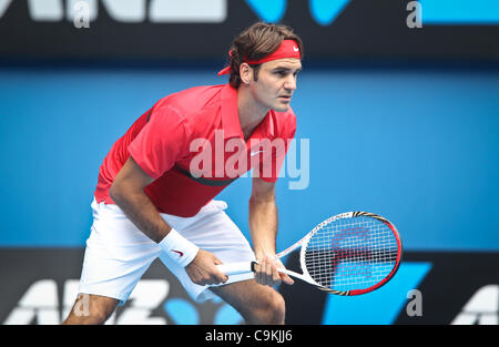 Roger Federer playing Ivo Karlovic at the Australian Open, Melbourne, January 20, 2012. Stock Photo