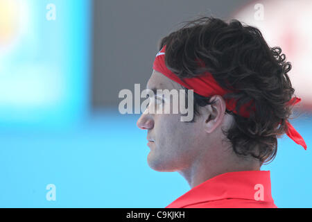 Roger Federer playing Ivo Karlovic at the Australian Open, Melbourne, January 20, 2012. Stock Photo