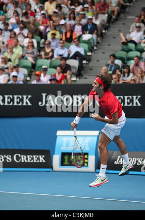 Roger Federer playing Ivo Karlovic at the Australian Open, Melbourne, January 20, 2012. Stock Photo