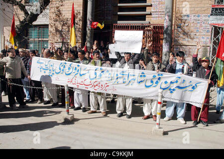 Supporters of Hazara Democratic Party (HDP) chant slogans in favor of their demands during a protest demonstration at Quetta press club on Friday, January 20, 2012. Stock Photo