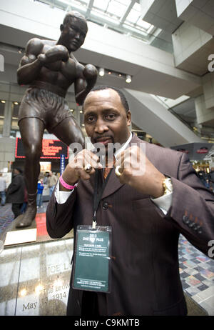 Jan. 20, 2012 - Detroit, Michigan, U.S - Legendary boxer Tommy ''The Hitman'' Hearns stands beneath a statue of Joe Louis inside Cobo Hall during the auto show in Detroit, MI on Jan 20, 2012. (Credit Image: © Mark Bialek/ZUMAPRESS.com) Stock Photo