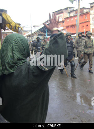 A kashmiri muslim women shout freedom slogans as indian police ...