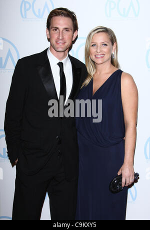 Jessica Capshaw and husband Christopher Gavigan arriving at the Grey's