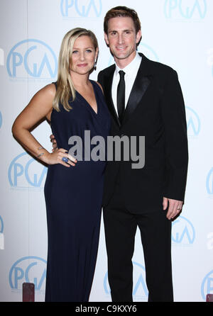 Jessica Capshaw and husband Christopher Gavigan arriving at the Grey's ...