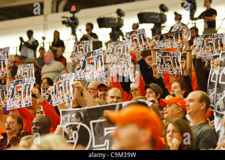 Jan. 22, 2012 - Bowling Green, Ohio, U.S - Fans hold up signs celebrating Bowling Green head coach Curt Miller's 250th win at the conclusion of the game.  Miller is the winningest coach in BGSU women's basketball history and is second on the MAC victories list.  The Bowling Green Falcons, of the Mid Stock Photo