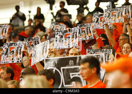 Jan. 22, 2012 - Bowling Green, Ohio, U.S - Fans hold up signs celebrating Bowling Green head coach Curt Miller's 250th win at the conclusion of the game.  Miller is the winningest coach in BGSU women's basketball history and is second on the MAC victories list.  The Bowling Green Falcons, of the Mid Stock Photo