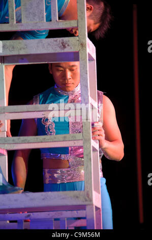 LINCOLN, CA - January 20: The Chinese Acrobats Of Hebei perform chair balancing at Thunder valley Casino in Lincoln, California on January 20, 2012 Stock Photo