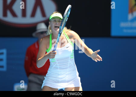 Maria Sharapova playing Ekaterina Makarova at the Australian Open Tennis, Melbourne, January 25, 2012. Stock Photo