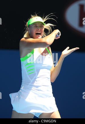 Maria Sharapova playing Ekaterina Makarova at the Australian Open Tennis, Melbourne, January 25, 2012. Stock Photo