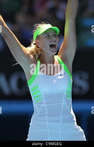 Maria Sharapova playing Ekaterina Makarova at the Australian Open Tennis, Melbourne, January 25, 2012. Stock Photo