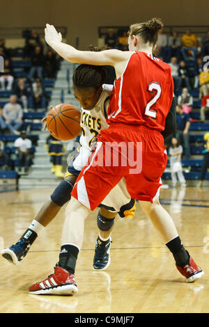 Jan. 25, 2012 - Toledo, Ohio, U.S - Toledo guard Andola Dortch (22) tries to drive around Miami (OH) guard Maggie Boyer (2) during second-half game action.  The Toledo Rockets, of the Mid-American Conference West Division, defeated the Miami RedHawks, of the MAC East Division, 79-66 at Savage Arena  Stock Photo