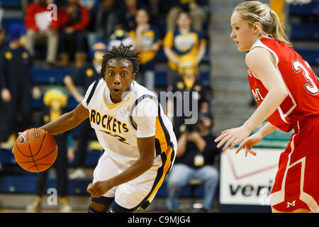 Jan. 25, 2012 - Toledo, Ohio, U.S - Toledo guard Andola Dortch (22) brings the ball upcourt against Miami (OH) guard Hannah Robertson (32) during second-half game action.  The Toledo Rockets, of the Mid-American Conference West Division, defeated the Miami RedHawks, of the MAC East Division, 79-66 a Stock Photo