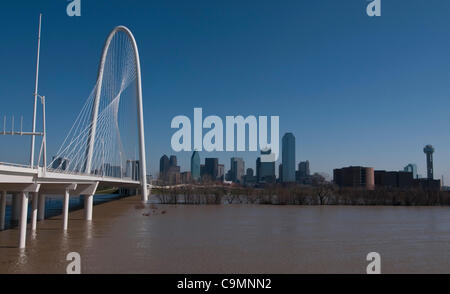 Jan. 26, 2012 - Dallas, Texas, USA - January 26, 2012. Dallas, Tx. USA. After heavy rains the flooded Trinity River runs underneath the soon to be opened Margaret Hunt Hill Bridge which connects Singleton Boulevard with the Woodall Rogers Freeway in West Dallas. The 40 story arch costing 117 million Stock Photo