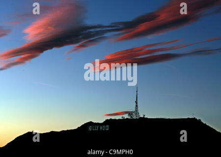 Los Angeles, California, US. Jan 26, 2012. A view of sunset above the Hollywood sign in Los Angeles, California. Credit: Ringo Chiu/Zuma Press/Alamy Live News Stock Photo