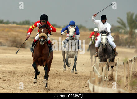 Jan. 28, 2012 - Jericho, West Bank, Palestinian Territory - Palestinian jockeys take part in a horse race at an equestrian club in the West Bank city of Jericho.(Credit Image: © Issam Rimawi   Apaimages/APA Images/ZUMAPRESS.com) Stock Photo