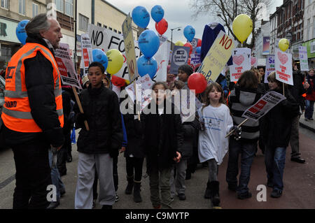 28/01/2012 Haringey, London UK. Young students lead a protest against plans to turn Downhills primary school Tottenham into a sponsored academy. Stock Photo