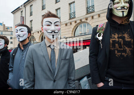 Anonymous Protest Against Internet Anti-Piracy Law, ACTA (Anti-Counterfeiting Trade Agree-ment), that threatens freedom of the Internet, Paris, France, Stock Photo