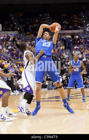 United States forward Anthony Davis, left, drives to the basket past ...